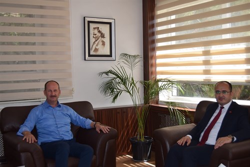 AHMETLİ KAYMAKAMI SAYIN ABDULLAH KURT'TAN YUNUSEMRE KAYMAKAMI SAYIN ATİLLA KANTAY'A VEDA ZİYARETİ